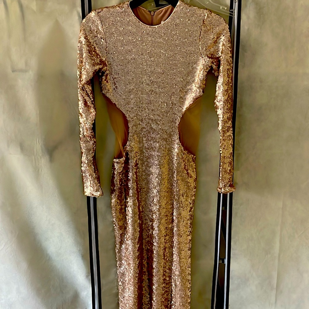 Gold sequence gown with cut outs